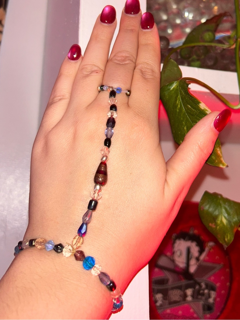 Free People Hand Chain Bracelet in Blue, Black, Brown and Clear Beads